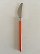 Hans Hansen 
Amalie Dinner 
Knife with 
Orange Enamel 
Handle. 21 cm L 
(8 17/64")
