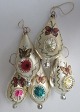 Antique 
Christmas 
decorations, 
19th century. 
Germany. 
Colored glass 
with up stuck 
pictures of ...