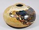 Walther, Conny 
(1931 -) 
Denmark: Vase. 
Glazed 
stoneware. 
Signed: CW. Ø. 
24, H. 13 cm. 
Around 1960.