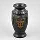 Japanese vase 
with 
decoration. 
1900. Black. H. 
25 cm. Signed: 
Made in Japan.
 
