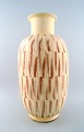 Kähler, Denmark, large glazed stoneware floor vase in modern design.
1940s.