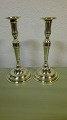 A pair of tall 
Danish brass 
candlesticks 
with loose 
cuffsStampet 
LassenCa. From 
1815Height 
24.5cm.