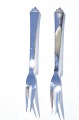 Georg Jensen 
sterling 
silver. Pyramid 
silver cutlery 
Designed by 
Harald Nielsen 
in 1927. 
Meat ...