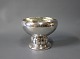 Simply 
decorated 
centerpiece in 
hallmarked 
silver.
H - 16 cm and 
Dia - 19,5 cm.