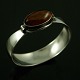 N.E. From. 
Danish Sterling 
Silver Bangle 
with Amber. 
1960s
Designed by 
N.E. From 
Silversmithy 
...