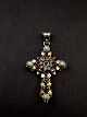 Silver cross with stones