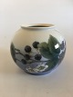Royal 
Copenhagen Bowl 
No 288/42B with 
Blackberry. 
14.5 cm H. (5 
45/64"). 2st 
Quality. In 
nice ...