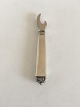 Evald Nielsen 
no. 28 Bottle 
Opener in 
Silver.10.7 cm 
L (4 7/32"). In 
good condition