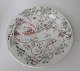 Japanese 
Kaikemon Plate, 
19. Decorated 
with flowers 
and landscape. 
Stamped. Dia: 
21 cm.