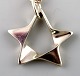 Georg Jensen: Necklace, decorated with star, made of 925 sterling silver.
Pattern No. 187.