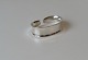 Georg Jensen 
Cypres napkin 
ring in 
sterling silver 

Stamped: Georg 
Jensen - 
Sterling - 
Denmark ...