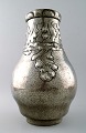 Art nouveau vase in hammered tin/pewter. 
Stamped with Arendal