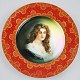 German 
Rosenthal 
plate. 
Red/brown/gold 
flower 
decorations 
and decorated 
with a young 
girl in the ...