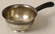 Sauciere in 
silver with 
handle in 
palisander, 
Denmark.
Three Towers, 
stamped in 
1939.
Weight. ...