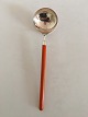 Hans Hansen Amalie Sterling Silver Serving Spoon with Orange Plast Handle