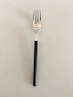Hans Hansen 
Amalie Luncheon 
Fork In 
Sterling Silver 
with Black 
Plast Handle. 
17 cm L (6 
11/16")