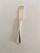 Patricia W&S 
Sorensen 
Sterling Silver 
Butter Knife. 
17 cm L (6 
11/16")