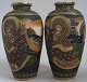 Pair of Satsuma 
vases, Japan, 
19th century. 
Inverted. 
Decorated with 
gods in front 
of a temple. 
...
