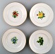 4 antique Royal Copenhagen flat plates in flora danica style.
