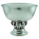 Georg Jensen 
silver. 
Georg Jensen; 
A circular 
hammered 
sterling silver 
bowl. Openwork 
stem ...