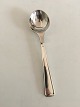 Georg Jensen 
Koppel Sterling 
Silver Spoon 
with Steel 
Montage. 
Measures 15.5 
cm / 6 7/64"