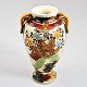 Satsuma vase, 
Japan, 19th 
century. 
Faience. 
Polycrom 
decoration in 
the form of 
warriors. With 
...