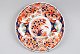 Imari plate. 
Japan. 19th 
century. 
Polycrom 
decoration with 
flowers and 
birds. Dia: 25 
cm.