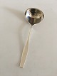 Hans Hansen 
"Charlotte" 
Sterling Silver 
Gravy Ladle. 
Measures 18 cm 
/ 7 3/32 in.