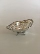 Birks pierced 
silver bowl on 
feet.
Measures  12cm 
x 8,7cm and 
4,5cm high / 4 
7/10" x 3 2/5" 
...