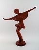 Keramos, Vienna, dancing woman, figure in red clay. Art Deco.
