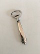 Georg Jensen 
Akkeleje 
Sterling Silver 
Bottle Opener 
No 272. 
Measures 12 cm 
/ 4 5/8 in. Has 
some wear