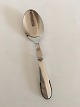 Georg Jensen 
Beaded Serving 
Spoon in 
Sterling Silver 
and Steel No 
96. Measures 
19.3 cm / 7 
19/32 in.