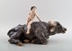 Rare Royal Copenhagen figure, naked boy on water buffalo.
Model number 1849.