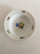 Royal 
Copenhagen 
Antique Deep 
Plate with 
Flower 
Decoration. 23 
cm dia. The 
handpainted 
motif is ...