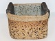 Richard Manz 
aert pottery.
Square jar 
with folded 
edges and 
different 
glazes.
From his own 
...