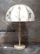 Josef Frank for Swedish Tenn large art deco table lamp with cream-colored floral 
fabric screen, white stem of wood.