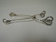 Georg Jensen. 
Sterling (925). 
Ice Tongs. 
Length 13.5 cm. 
Produced 1933 - 
1945.