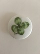 Royal 
Copenhagen 
Porcelain 
Button with 
Handpainted 
Flower Motif. 3 
cm dia.