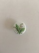 Royal 
Copenhagen 
Porcelain 
Button with 
Handpainted 
Flower Motif. 
1.7 cm dia.