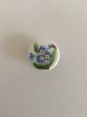 Royal 
Copenhagen 
Porcelain 
Button with 
Handpainted 
Flower Motif. 
1.7 cm dia.