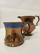 Lustre mug and 
lustre jug
H: 10,5cm 
(mug), 14cm 
(jug) 
Articlenr.: 
41119 (mug) og 
41971 (jug)