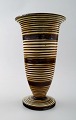 Kähler, Denmark, glazed stoneware vase with stripes on round foot.
