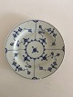 Royal 
Copenhagen 
Antique Blue 
Fluted Plain 
Plate. Measures 
24.5 cm dia. / 
9 41/64 in. The 
plate ...