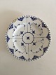 Royal 
Copenhagen 
Antique Blue 
Fluted Full 
Lace Plate. 
23.5 cm dia. / 
9 1/4 in. 
Chipped and ...