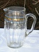 Old glass jug 
with enamel 
decoration. 
Height 16 cm. 
Fine condition.