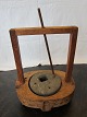 Hand-Mill, mustard-mill, antique, about 1800
This Hand-mill is incl. the stone as well as the 
stick
By placing the stick into one of the small holes 
you are able to turn the stone around and the 
liquid will flow out of the spout (please see the 
photo)