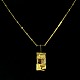 Lapponia. 14k 
Gold Necklace - 
Björn Weckström 
- 1974
Pendant with 
Clear and 
Smokey ...