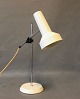 Desk lamp with 
white lacquered 
shade and foot 
and frame of 
chrome. The 
lamp is of 
danish design 
...