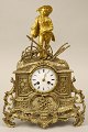 French Console watch in Bronze, o. 1840-60.Box with rococo pattern and foliage, piercings in ...