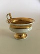 Royal 
Copenhagen 
Empire Cup from 
1820-1850.
Has a chip and 
hairline
The cup 
measures 8cm/ 
...